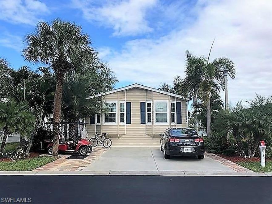 Like new 2017 Jacobson Park Model Home.  Located in Silver Lakes RV Resort between Marco Island and Naples. 
 Location, Location, Location! Two Bedroom/two bathroom home with large open floor plan overlooking the lake with northern exposure.  So many upgrades in this home: impact windows and sliders, all granite counter tops in kitchen and baths, crown molding, stainless steel appliances, crown molding, walk in master closet, wood flooring, and Florida room/lanai is air conditioned.  This property has very tasteful landscaping and extended driveway with pavers.  This home is being sold unfurnished, but is negotiable.  Take advantage of this newly constructed home that is move in ready.