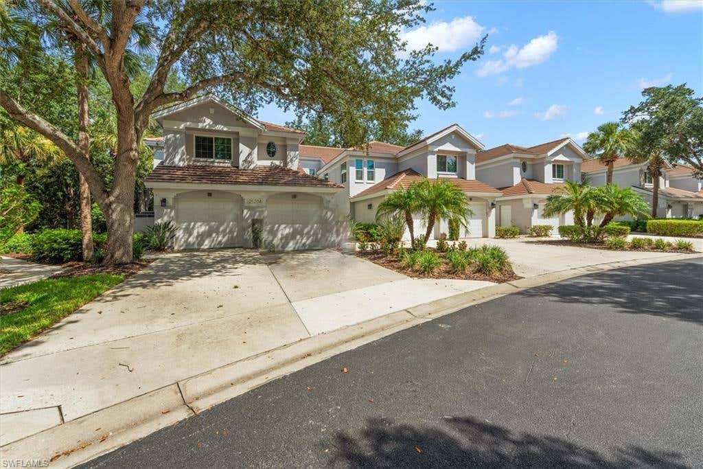 Photo of 25204 Pelican Creek CIR #101, BONITA SPRINGS, FL 34134 (MLS # 226027497)