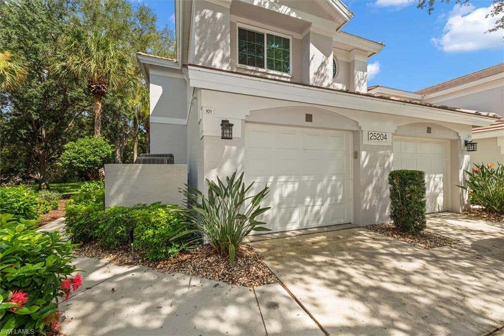 Photo of 25204 Pelican Creek CIR #101, BONITA SPRINGS, FL 34134 (MLS # 226027497)