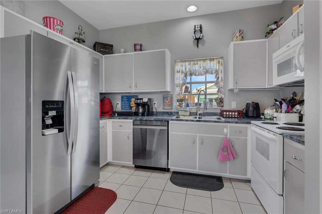 Photo of 10717 Tropical Moon CT, ESTERO, FL 33928 (MLS # 226027705)