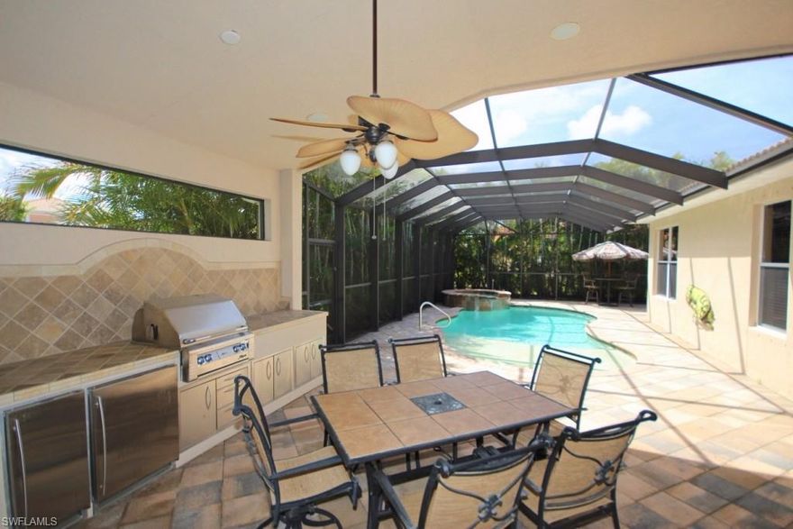 Welcome to Your Tropical Oasis! This stunning St. Lawrence model, in the luxurious community of Belle Lago built by Toll Brothers, has it all! Located on a huge corner lot, this single level home offers 3 bedrooms, 3 FULL bathrooms, den, & fabulous entertainer's layout. You'll enjoy the SW Florida lifestyle in your huge outdoor area. With over 1500 square feet, the lanai is everything you could want! Custom pool with sun ledge & waterfall spa, heated by gas, CHECK! Outdoor kitchen with grill, fridge, sink & cabinets, CHECK! Ample covered & open space, CHECK! Utmost privacy, CHECK! The interior of the house is amazing as well. The kitchen has been completely upgraded...beautiful cabinets & granite, stainless appliances including beverage fridge, trash compactor & GAS range! The great room is large enough for any family & their friends, and it & the dining area overlook the lanai. There is a large den (could be a large formal dining). The master is of grand size, overlooking the lanai & has TWO baths & walk-ins, one of which doubles as a pool bath. Belle Lago offers beautiful amenities, as well as optional membership to Estero Country Club. CLICK VIRTUAL TOUR LINK FOR 3D FLOORPLAN!