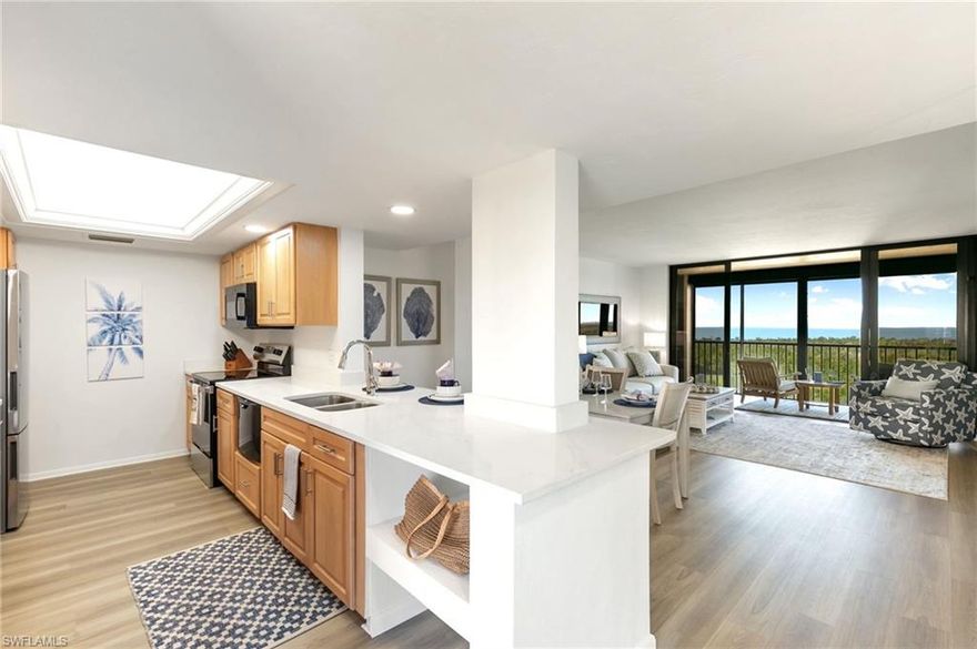 STUNNING, MOVE-IN Ready condo featuring a substantial renovation and brand-new contemporary coastal furnishings & contents— all included in the sale! Enjoy peace of mind with a new HVAC system and beautifully updated interiors throughout. Highlights include luxury vinyl plank flooring, an open-concept kitchen with breakfast bar, quartzite countertops in kitchen and baths, new vanities, fixtures, and fresh paint throughout. Relax as you gaze at the stunning 6th floor views of Turkey Bay, the Mangroves and the sparkling Gulf beyond. Walk to the beach, tennis, Pickleball or marina and live your best Life! Surf Colony III boasts the best elevation on Baker-Carroll Pointe, a beautiful, peaceful location, walking distance to either Bluebill or Delnor-Wiggins Beach on the North end of Gulf Shore Drive at Immokalee Rd (called Bluebill if west of 41).