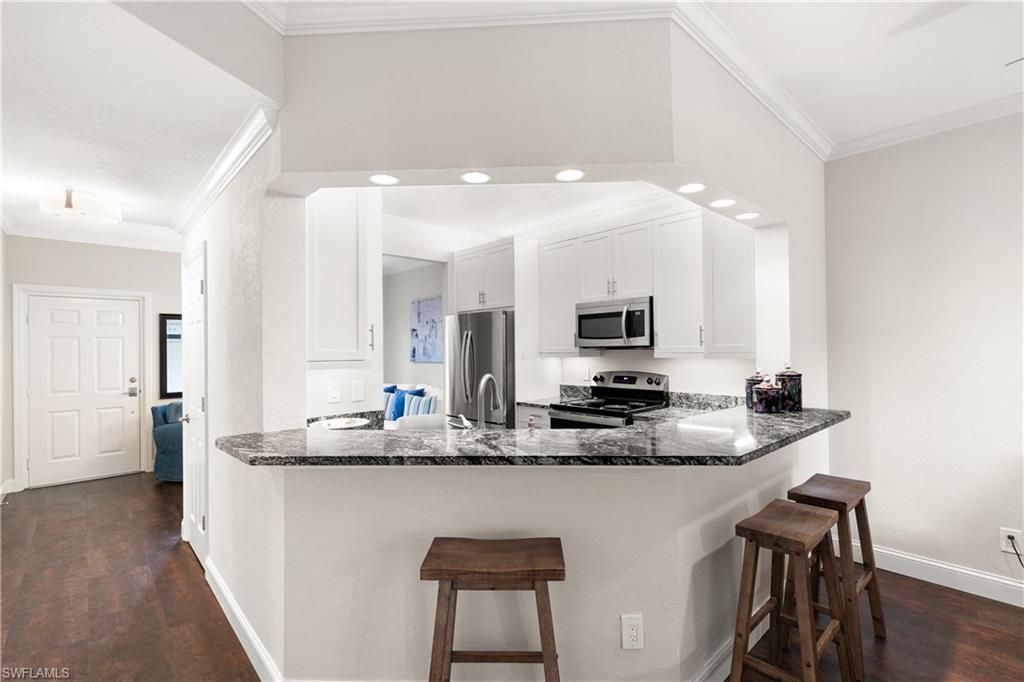 Photo of 829 Tanbark DR #103, NAPLES, FL 34108 (MLS # 224006014)