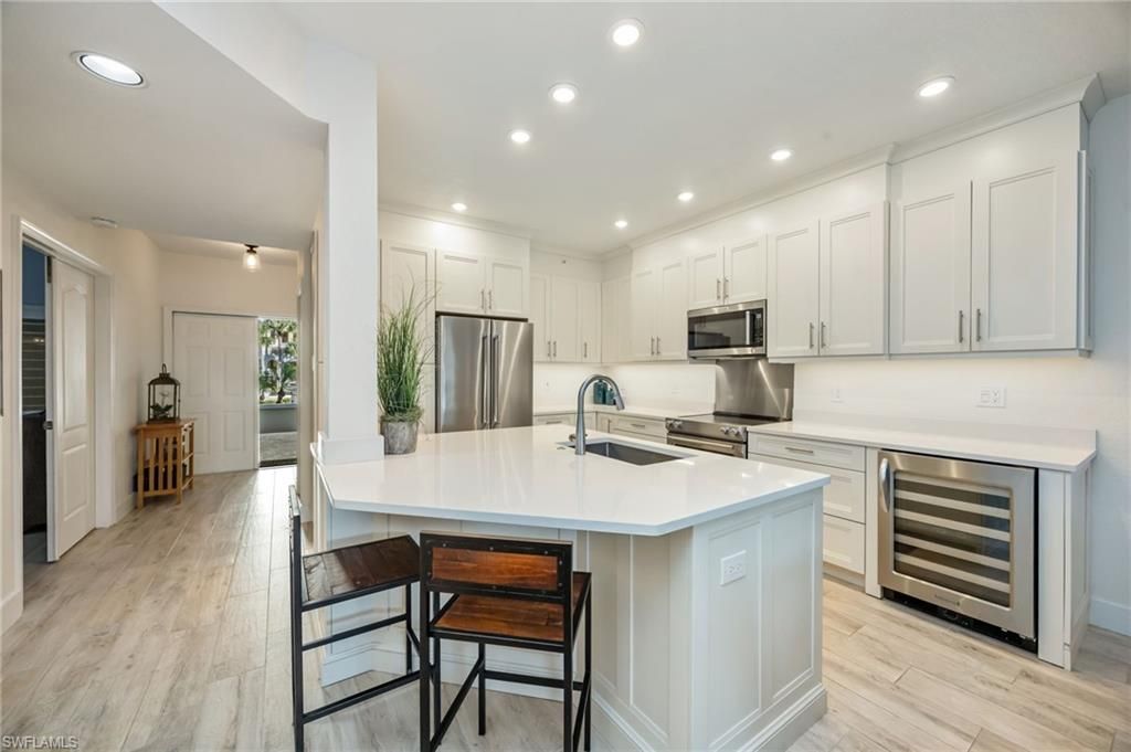 Photo of 7686 Pebble Creek CIR #102, NAPLES, FL 34108 (MLS # 226003035)