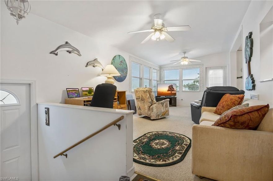 Welcome to paradise. Picture yourself sitting on the patio with a cup of coffee as you watch the sun come up over the lake.  This is one of the best properties in the park as it has a gorgeous lake view. it is beautifully decorated with a large kitchen and living area, a separate storage shed/workshop and it's just a short walk to a beautiful pool.This active 55+ community has 2 pools, 2 hot tubs, clubhouse with a fitness center, billiard room, and library as well as a large common area.  There are potlucks, dances, cards, bingo, tennis, petanque, shuffleboard, and much more! Because of Covid-19 some of these activities are cancelled for now. A monthly newsletter and a private Facebook page will keep you up to date.  This gated community has miles of space for walking, biking or tooling around in our golf cart.  Eleven miles to Naples, 8 miles to Marco Island, 2 miles to CVS and Walgreens, 2.5 miles to Walmart or Publix. This home is a must see!