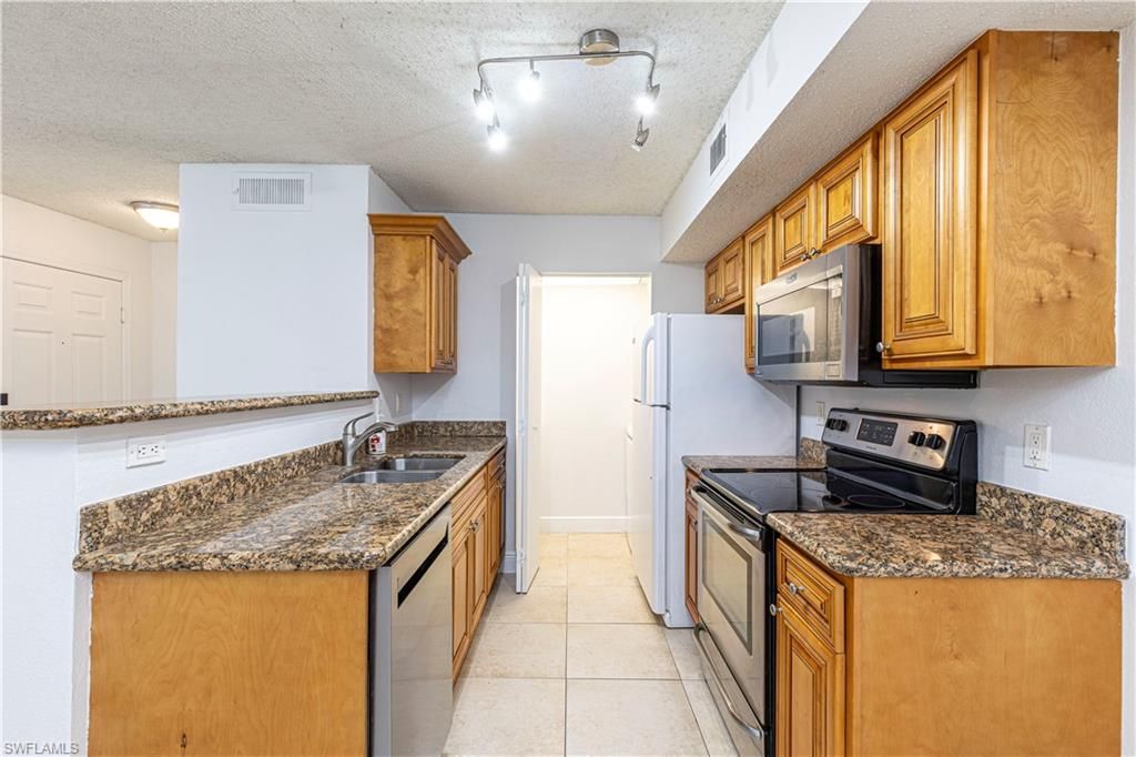 Photo of 12610 Equestrian CIR #1613, FORT MYERS, FL 33907 (MLS # 226019807)