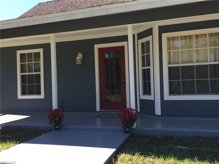 3/2 pool home on 2.81 acres of land! Home features newly renovated eat-in kitchen with custom cabinets, stainless steel appliances, and granite counter tops. New hand-scraped, engineered hardwoods in the main living area, attached 2-car garage with new door, and private screened lanai with pool and spa. The interior and exterior of the home are freshly painted. Close to schools and Corkscrew Sanctuary. Definitely a must see!