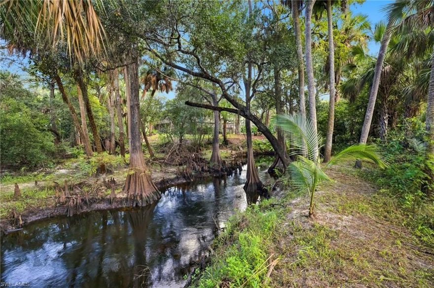 SELLER FINANCING AVAILABLE. An extraordinary waterfront development opportunity awaits along the Imperial River in beautiful Bonita Springs. This eight-parcel assemblage spans more than three acres of prime property, including a 3-acre section zoned Commercial Interchange with High-Intensity Commercial Future Land Use—allowing a wide range of possibilities such as waterfront dining, a riverfront tiki bar, boutique retail, entertainment, or hospitality without the need for rezoning. The balance of the property includes adjoining parcels along Carpenter Lane and Oakland Drive, offering flexibility for supporting uses, parking, or complementary residential or mixed-use concepts. Together, the sites feature approximately 1,000 linear feet of frontage on the Imperial River, surrounded by century-old cypress, stately oaks, and tropical palms. All utilities are already in place and installed underground, including electric, water, sewer, and communication services, making this property development-ready. Accessed by a city-maintained road just one block from Interstate 75, the location provides exceptional visibility and convenient connectivity between affluent Naples and historic Fort Myers—in what is currently one of the fastest-growing metropolitan areas in the United States. The City has confirmed that development on 3- to 4-foot structural piers is consistent with riverfront construction standards and satisfies requirements for commercial improvement along the Imperial River. This natural, unspoiled stretch of the Imperial River—originating from the renowned Corkscrew Swamp Sanctuary, home to the largest stand of virgin bald cypress in the world—offers one of the most breathtaking settings in Southwest Florida. Property is being sold as a package together with the following parcels and STRAP numbers: 31-47-26-B4-00300.1080 (Undetermined); 31-47-26-B4-00210.0070 (12057 Carpenter Ln); 31-47-26-B4-00210.0080 (12067 Carpenter Ln); 31-47-26-B4-00209.0010 (27770 Oakland Dr); 31-47-26-B4-00209.0090 (12045 Carpenter Ln); 31-47-26-B4-00300.1060 (Undetermined); and 31-47-26-B4-00300.1070 (Undetermined). This composite riverfront offering represents a rare, shovel-ready opportunity to create a world-class destination capturing the beauty, vitality, and spirit of Bonita Springs.
