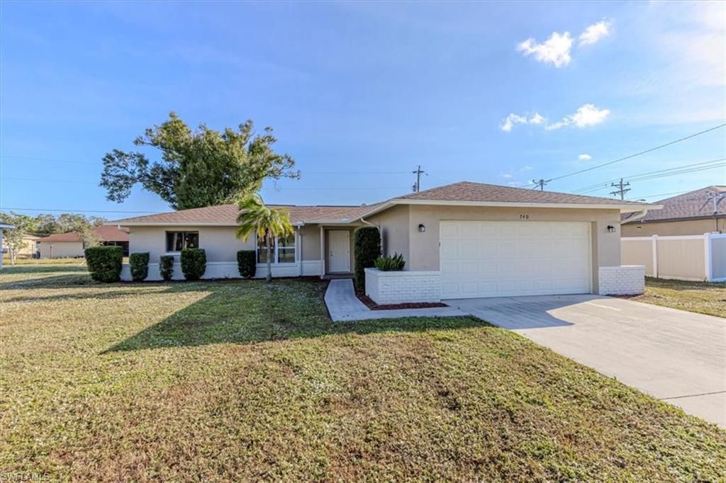 Photo of 740 SW 5th ST, CAPE CORAL, FL 33991 (MLS # 225082657)