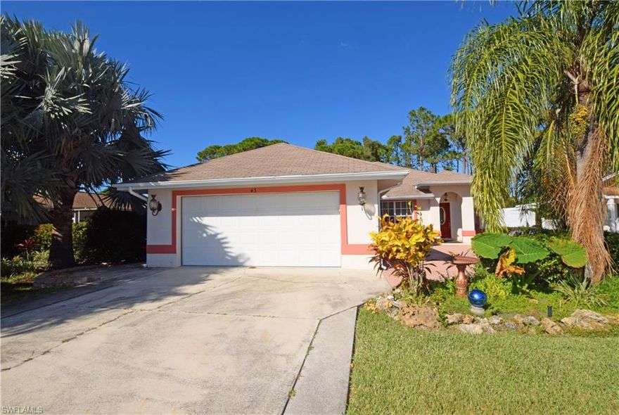 WEST OF 41 – Beautiful, well-designed, Bonita Shores pool home. Enjoy this spacious, 3 bedroom plus office area home, including 2 full baths. Home features Brand new tile throughout, high ceilings, open floor plan, large master bedroom, and separate laundry room.  Lots of space in the 2-car garage including pull down attic storage.  You and your guests will enjoy the newly-designed backyard with salt water pool and spa, outdoor dining area, fenced yard, outdoor shower and lots of privacy. Pool, pavers, and fencing installed in 2014, New solar panels in 2016. 
Bonita Shores is just off Vanderbilt Beach Drive. Have your pick between the white sands of Bonita Beach and Vanderbilt Beach! Great Location for shopping, restaurants and a short trip to the airport.. Bonita Shores offers a voluntary boat club membership that enables the use of boat launch on 3rd Street for Gulf access, eligible homeowners have unlimited use of  private boat ramp, docks, picnic area and associated grounds.  In addition, Bonita Shores clubhouse and activities are available with very low annual membership dues. Neither is mandatory, but great opportunity to enjoy some fantastic amenities and social life.