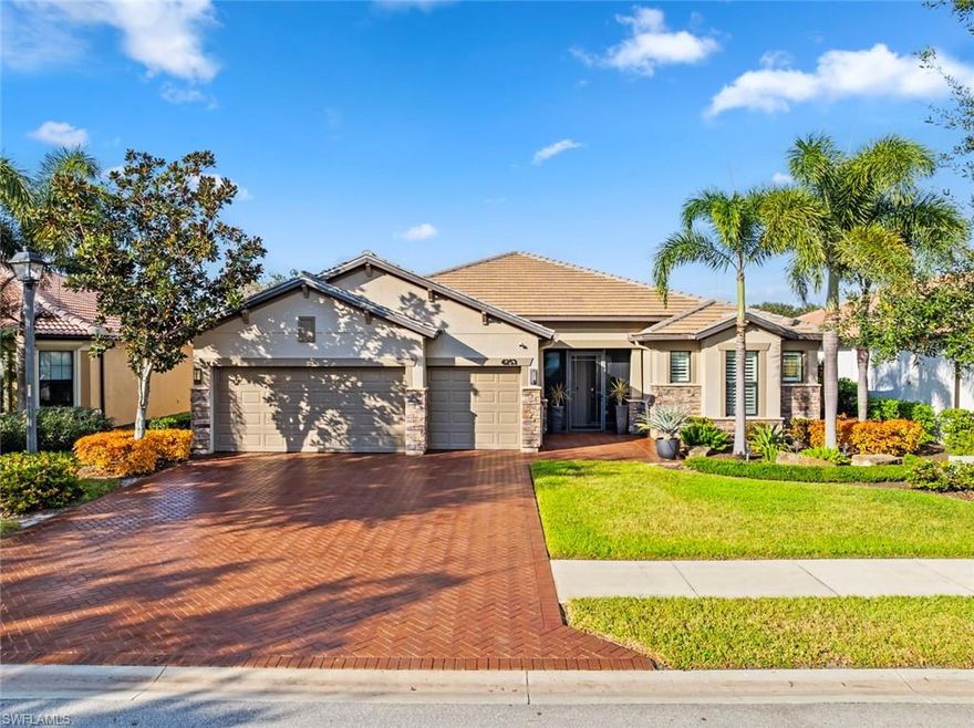 This home HAS IT ALL - GOLF MEMBERSHIP, BREATHTAKING WATER & GOLF COURSE VIEWS, and a LUXURIOUS SALTWATER HEATED POOL - all located within the 55+ Del Webb Naples community. Better than new construction and truly MODEL-HOME PERFECT, this upgraded PINNACLE floor plan (similar to the STELLAR) delivers the LUXURY LIFESTYLE today’s buyers desire.

Step inside and immediately notice the exceptional finishes and meticulous care throughout. This 3-bedroom, 3-bath plus den residence features REMODELED KITCHEN AND BATHROOMS, PLANTATION SHUTTERS, electric roller shades, upgraded bedroom carpet, DESIGNER LIGHTING and ceiling fans, and fresh interior and exterior paint for a clean, modern feel.

The PRIMARY SUITE is a luxurious retreat with a large walk-in shower, CUSTOM CLOSET, and dual sinks. The KITCHEN is a chef’s dream with quartz countertops, upgraded appliances, a new sink and faucet, a custom pantry, and a beverage center - perfect for effortless entertaining.

Additional highlights include ZERO-CORNER SLIDERS, IMPACT GLASS WINDOWS, a new AC system (2020), new refrigerator (2024), new washing machine (2025), floor to ceiling tile in the bathrooms, and upgraded PLANK TILE.  Enhanced LANDSCAPING WITH EXTERIOR LIGHTING elevates the home's curb appeal. 

The outdoor living space is pure Florida luxury - your screened-in saltwater pool with super screens and a PANORAMIC PICTURE-FRAME VIEW creates an unforgettable setting for relaxation or hosting guests. A Storm Smart ELECTRIC HURRICANE SCREEN adds both comfort and confidence.

The oversized GARAGE - complete with a 4’ extension, epoxy floors, attic fan, insulated doors, and smart openers - offers impressive storage and functionality.

In Del Webb Naples, you’ll enjoy WORLD-CLASS AMENITIES that rival luxury resorts: dine at the Rusty Putter Restaurant, soak in the RESORT-STYLE or LAP POOLS, break a sweat in the state-of-the-art FITNESS CENTER, and play your way through PICKLEBALL, TENNIS, bocce, billiards - even a top-tier GOLF SIMULATOR!
Need groceries, church, or a bite to eat? Just hop in your golf cart and cruise into town - Publix and the heart of Ave Maria are just minutes away.
This isn’t just a home - it’s a LIFESTYLE UPGRADE in one of Southwest Florida’s most vibrant 55+ communities. Don’t miss your chance to live where fun, fitness, and friendships flourish year-round!