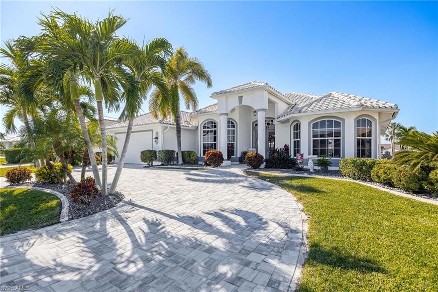 Oh, this is the one! As you enter, the first thing that captures your attention are the large sliding glass doors framing stunning views of the screened-in lanai, pool, and canal. On a perfect day, open the doors and let the refreshing breeze flow through the home. Step through French doors to the primary bedroom, where sliding glass doors surround the space, flooding it with natural light and offering beautiful views of the water. The en-suite primary bathroom, featuring dual sinks, a separate tub and shower, and spacious walk-in closets. The large living room, with its high ceilings, seamlessly flows into the open-concept kitchen - with brand new 2022 appliances, making it ideal for both entertaining and everyday living. A cozy breakfast nook sits just off the kitchen, offering the perfect spot to enjoy your morning coffee while taking in the scenic views. The home also features a bright and airy den complete with bay windows, offering a quiet place to work or relax. Step outside to the screened-in lanai, where you can bring down the electric sunshade and enjoy the best of Florida’s beautiful weather. Whether you’re lounging by the chlorine-based pool, taking in the canal views, or relaxing on the dock, this home offers the perfect blend of indoor and outdoor living, with beautiful sunsets over the Gulf Coast to top it off. Flood insurance assumable - $1,437.00 a year!