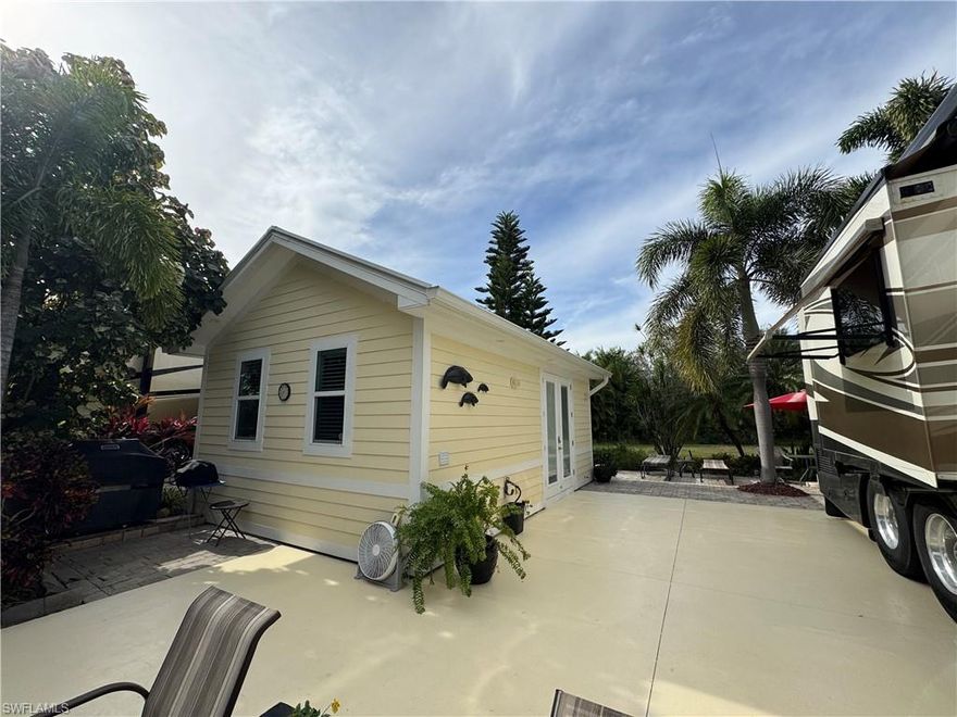 Your Tropical Paradise Awaits at Lot 45! Attention RV enthusiastscthis lot is a rare gem nestled in the heart of South Florida’s premier Class A Motorcoach resort, RiverBend Motorcoach Resort. Offering extras you didn’t know you needed, Lot 45 is designed to enhance your RV lifestyle with comfort, privacy, and style.This property provides convenient extra parking just across the street and a spacious backyard, perfect for ensuring privacy for you and your pets. The beautifully designed 16 x 24 coach house features two sets of French-style doors, creating an airy and elegant feel. Inside, you’ll find a versatile living area with neutral tones that allow you to add your personal flair, a kitchenette for quick meals, and a spacious bathroom complete with glass shower doors, a washer and dryer, with closet space for added storage. The lofted area offers even more storage options, while crown molding and up-lights add stylish touches and a cozy evening ambiance. This back-in lot offers plenty of privacy for entertaining and includes lovely landscaping that welcomes you and your guests every time you arrive. Just steps from the property, you’ll find a charming pedestrian bridge that overlooks the serene lake, complete with two lighted fountains that provide a picturesque view during the day and an enchanting ambiance at night. Another big plus, it is practically turnkey, the property includes furniture, BBQ, two golf carts and included other conveyable items, so please ask for details! RiverBend is a vibrant, pet-friendly golf cart community located along the breathtaking Caloosahatchee River. Residents enjoy exclusive access to a private boat ramp, ideal for exploring Florida’s waterways. The community offers resort-style amenities, including a sparkling pool, shuffleboard courts, bocce ball, and eight year-round pickleball courts. Two clubhouses elevate the lifestyle here: the River Clubhouse with stunning river views is perfect for gatherings, while the Pool Clubhouse features lap pools, hot tubs, and a cabana-inspired pool bar. For recreation, there’s a putting green, horseshoe courts, and a fully equipped exercise room. Seasonal activities bring even more excitement, with billiards, bingo nights, and a charming hobby train display under the oaks. This isn’t just a property, it’s an invitation to live the dream. Come discover the unparalleled charm and adventure of RiverBend Motorcoach Resort your new lifestyle is waiting!