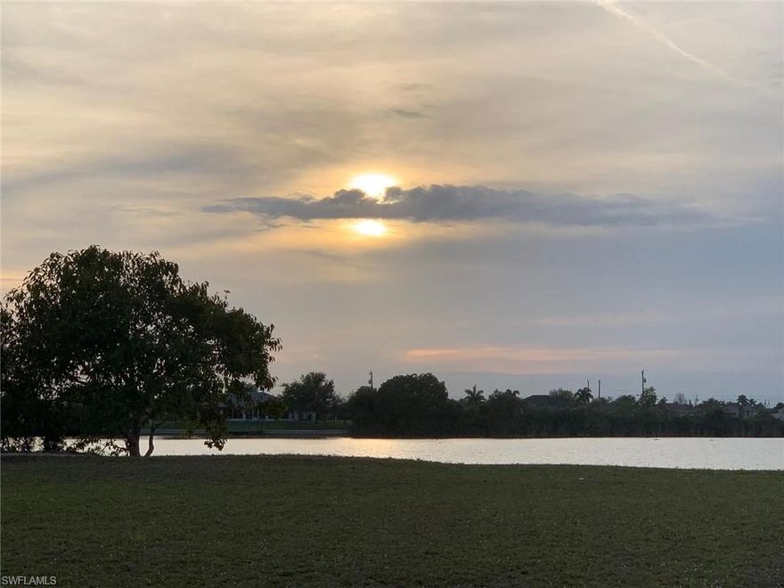 Beautiful property with amazing water view on Holiday Lake with western exposure. Great Location close to shopping and restaurants. Great opportunity the adjoining lot at 1142 NW 2nd Pl is also for sale!