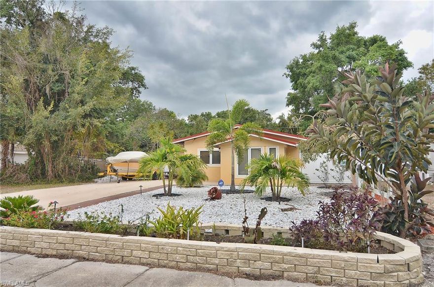 Totally refurbished and updated home in quiet neighborhood less than a mile from I-75. One block from river and free boat ramp. Spacious Island Kitchen with granite counters and stainless steel appliances. Beautiful master bath with double sinks, Jacuzzi tub, and separate shower. All wood and tile floors. Great back yard with above ground pool, large deck with cabana, fruit trees, and privacy fence. You will not find a single family home this nice at this price anywhere! New Roof in 2016! New A/C in 2017! Newly Stuccoed exterior. New electrical panel. Updated plumbing and interior walls and insulation. Act quickly, this home is priced to sell!