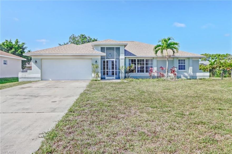 This home is located to the orange tree community. The Roof was replaced 2.5 years ago. Beautiful 3 bedroom 2 bath with a 2 car garage is all within walking distance to schools. When you walk into this home you will see a  Separate living room and Family room, double wall oven, smooth top stove with grill, French doors, pocket sliders in master bedroom (walk-in closet, jacuzzi and bidet in master bathroom), large lanai, huge indoor laundry room, 2 oversized bedrooms with walk-in closets, pass-thru kitchen sliding window, lighted plant shelf and large backyard with plenty of room to add a pool or host family events. Low HOA fees, Irrigation well and Community Amenities which include club house, pool, play ground,fishing pier and tennis courts. Close to shopping and gas.