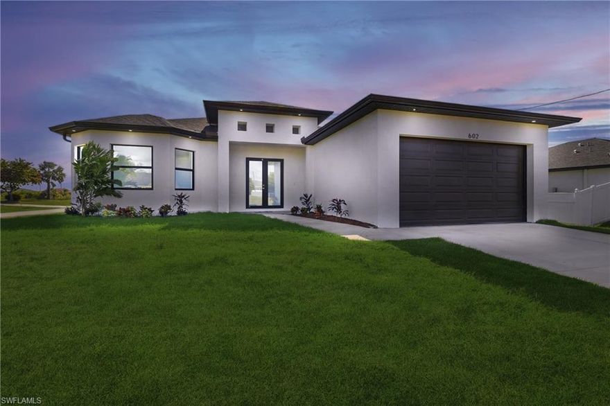 Welcome to this beautiful single-family home located in a great Cape Coral neighborhood. With 3 bedrooms plus a den and 2 bathrooms, this home features ceramic tile flooring, a modern open kitchen with stainless steel appliances and custom cabinetry, and a washer and dryer included. Beautiful color palette that goes perfect with any style. Painted garage floors for added convenience. The large backyard is perfect for gatherings and outdoor enjoyment, it offers plenty of space for a future pool and any improvement. No HOA fees. Builder Warranty for ease of mind. Just perfect to start enjoying your Floridian lifestyle.