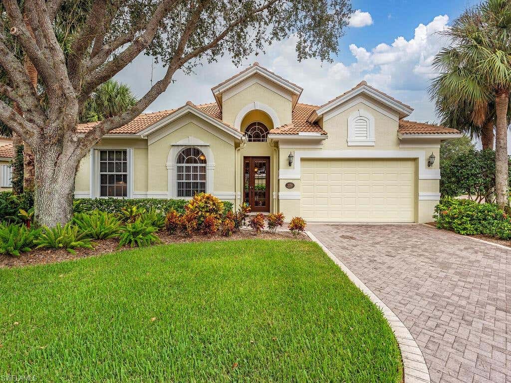 Photo of 2255 Island Cove CIR, NAPLES, FL 34109 (MLS # 223058499)