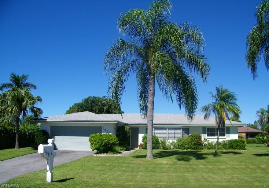 Convenient in-town location without HOA fees- this home is ready for you! Formal living room with oak flooring, crown molding and track lighting. Bedroom 3 has parquet flooring.  Split bedroom floor plan and a large screened porch are yours to enjoy . There are hurricane panels for all window openings. The fenced back yard is the perfect play area for your toddler or dog.  Please note: bedroom curtains do not convey.