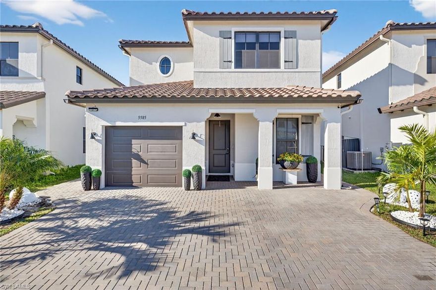 Welcome to 5585 Cobalto Way in Ave Maria! This grand Encinitas 2 story floor plan features 4 bedrooms and 3 1/2 baths. The primary suite is conveniently located on the first floor of of the main living area and boasts a large ensuite bathroom with expansive shower and dual sinks. The kitchen has plenty of quartz counter top space and cabinet storage for any chef! Upstairs we have 3 large bedrooms and a loft which can be used to watch your favorite shows, movies or sports teams or a perfect place for the kids to make their own. Upgrades have been made throughout the home including additional extended pavers around the exterior of the entire home, additional A/C splits added to the primary suite and the garage, beautifully decorated resin floors and cabinets in the garage as well as added storage, upgraded LED light fixtures throughout the home, blackout window treatments and a water filtration system. This home is only 2 years old and features hurricane impact doors and windows as well as a great backyard space that can be turned into your own personal oasis, come see it today!