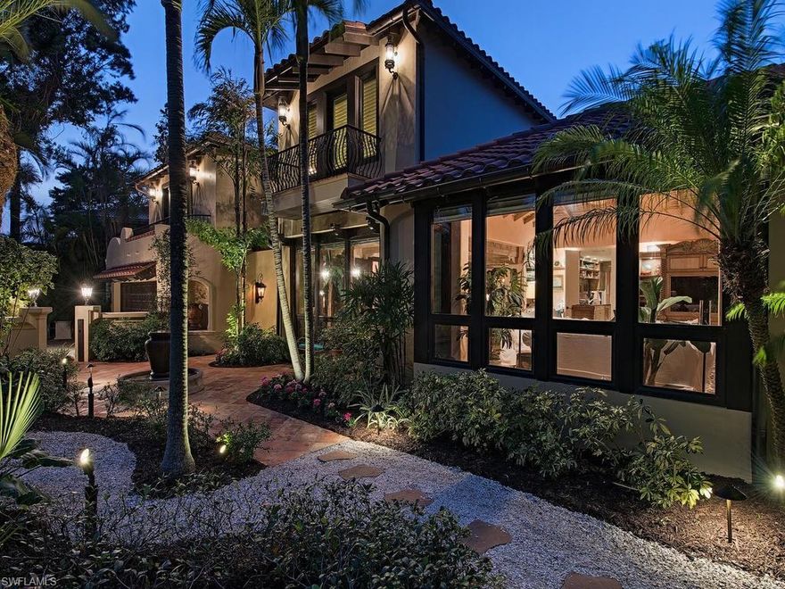 Welcome to Crackle Cottage, a well-kept Olde Naples secret! This enchanting property offers unique character while featuring recent renovations and a new second floor addition. Extraordinary beamed ceilings grace every room with beautifully detailed finishes throughout. The updated kitchen with Rookwood tile and stainless-steel appliances offer all the comforts of a modern kitchen, while still encompassing old world charm. Countless windows provide an abundance of light and private views of beautiful lush landscaping. The much-coveted downstairs master suite includes dual bathrooms and three additional spacious guest suites can be found upstairs. Situated only 7 houses away from the beach, this location is perfect for enjoying endless hours of entertaining, or peace and tranquility in your private outdoor oasis that includes a sparkling wrap around pool and fountains. All within minutes to the fabulous dining and shopping that downtown Naples is famous for. An amazing find for those who demand something truly special, this property is one of a kind with an intriguing story making it a must see!