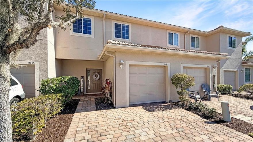 This well-appointed 3-bedroom, 2.5-bath townhome offers a 1-car garage and nearly 1,600 sq. ft. of living space in a gated community, making it a wonderful option for a primary residence or a seasonal Southwest Florida getaway. Step inside to find a generous foyer that opens to a bright, open layout with tile flooring throughout the entire first floor, designed for both everyday living and entertaining.

The kitchen is a dream, featuring granite countertops, espresso-colored wood cabinetry, custom backsplash, stainless steel appliances, above- and under-cabinet lighting, and a generous breakfast bar that flows seamlessly into the spacious great room. A custom TV accent wall anchors the living space, which opens to a screened lanai and continues out to an expanded pavered open patio—perfect for enjoying Florida’s indoor-outdoor lifestyle.

Upstairs, the split-bedroom floor plan offers privacy and functionality, with neutral carpet, neutral paint throughout, and a convenient second-floor laundry with washer and dryer located near all bedrooms. Additional highlights include a tile roof, pavered entry and driveway, and the added peace of mind of being located outside of a flood zone.

The community delivers a true resort-style lifestyle, featuring gated entry, pool and spa, clubhouse, fitness center, and play area—ideal for relaxation, recreation, and social gatherings. Whether you’re unwinding poolside or staying active, the amenities support a low-maintenance, lock-and-leave lifestyle.

Ideally situated with quick access to I-75, RSW International Airport, the new Lee Memorial Hospital, The Shoppes at the Forum, Gulf Coast Town Center, Miromar Outlets, dining, and entertainment, this home places shopping, travel, healthcare, and everyday conveniences within easy reach.

Whether you’re seeking full-time living or a seasonal escape, this home offers a lifestyle centered on comfort, convenience, and effortless Southwest Florida living—leaving you more time to enjoy everything this vibrant area has to offer.