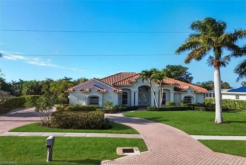 Photo of 560 Inlet DR, MARCO ISLAND, FL 34145 (MLS # 226002092)