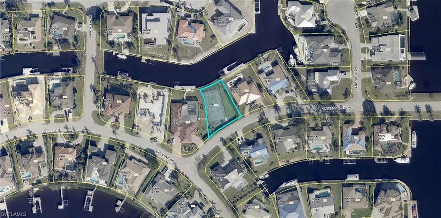 Deep Water direct gulf access lot in Town and River!  Minutes to the Intercoastal waterway.  Sailboat access.   Owner has renderings (attached) for a custom designed 2500 sq ft under air single story home with 3 car garage, however a larger home could be accomodated, with a second floor.  Located at the "river" end of Cypress Lake Drive and corner of Cal Cove Dr  (Estate section of T&R).  Underground utilties and city sewer available.  Deed restricted.  Voluntary HOA of $160 per year.

Dock info:  A boat and dock can not extend beyond 20 feet into the canal and the side set backs are 12.5 feet on each side.  A boat can not extend beyond the dock length.  The largest dock would be approx 44.5 feet long and 20 feet wide.

Seller would also consider offers on the adjoining 3900 sq ft home with 5 bed + office, 4 full bath home at 9990 CLD.  Both parcels together are .75 acres with 160 sq ft of canal frontage.