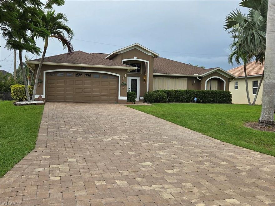 Discover the Florida lifestyle in this pool home located in the highly sought-after 33914 zip code of southwest Cape Coral. Offering peace of mind and move in readiness, this property features recent updates including a shingle roof (2018), Windows (2020), and high efficiency A/C system with a UV light for improved air quality (2018). Step inside to a spacious, split-bedroom floor plan that spans over 1800 sq. ft. of living area. The heart of the home is the open kitchen featuring gleaming Granite countertops, ideal for entertaining. Unique to this model, all 3 bedrooms feature walk-in closets, providing abundant storage for each room. Need a home office, or media room? The Den/Flex room offers the versatility to suit your specific lifestyle needs. Outdoor living is a breeze with the screened-in pool (2011), creating the perfect setting for entertaining or enjoying the Florida lifestyle. The home is fully equipped for storm protection with accordion shutters all around. additional value-added features include and ADP alarm system for added security and a cost saving lawn sprinkler system that utilizes recovery water. Conveniently located minutes from the dining and shopping on Cape Coral Pkwy, Cape Harbor Marina, and Tarpon Point Marina. Short distance to local parks, for tennis and pickleball. This home combines comfort and a prime location. Schedule your showing Today!