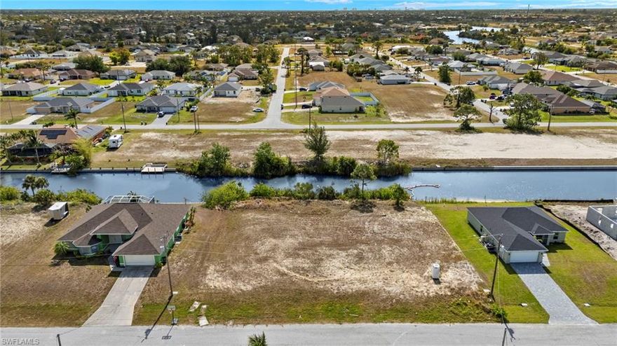 Experience the ultimate in waterfront living with this stunning lot in NW Cape Coral! Imagine building your dream home in a serene setting, surrounded by the beauty of Florida's lush landscapes and vibrant sunsets. Don't miss out on your chance to invest in your piece of paradise!
