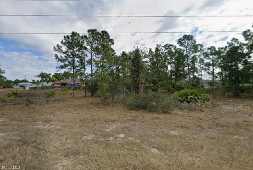 Build your dream home on this spacious 0.24-acre residential lot located in a growing area of Lehigh Acres. This regular-shaped parcel offers approximately 10,555 sq ft with southern rear exposure, providing great natural light throughout the day. The property is zoned for single-family use and is ideal for new construction or long-term investment.

Conveniently situated on an access road with utilities available nearby, including electric, cable, phone, and trash removal. The lot requires well and septic installation. No HOA fees and no mandatory fees make this an attractive and flexible opportunity.

Surrounded by developing homes while still offering privacy, this property provides easy access to main roads, schools, shopping, and dining. A great opportunity to secure land in a steadily expanding community.