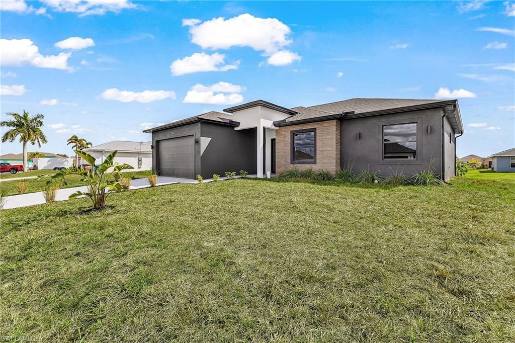 Photo of 316 NW 10th ST, CAPE CORAL, FL 33993 (MLS # 226010599)