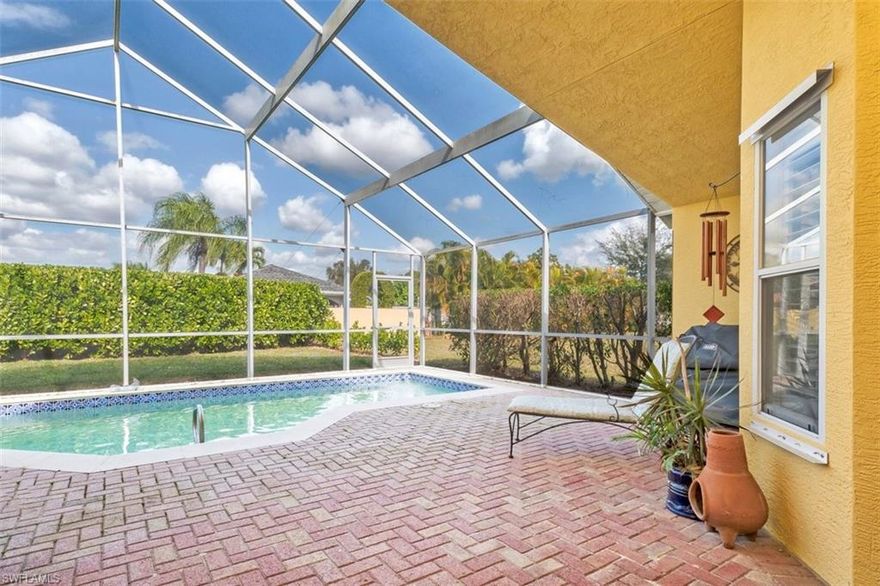 REDUCED $15,000!! What are you waiting for!? Check out this picture perfect home out and make an offer today!! Extremely well maintained pool home just minutes to downtown Naples! This immaculate 3 bedroom 2 bath home located in the established community of Queens Park. This charmer boasts an open floor plan with soaring ceilings and tons of storage with built-ins and lots of closet space. Beautiful plantation shutters add to the charm...an eat-in kitchen with solid surface counters and white cabinets plus a living room dining/room combo makes for easy entertaining! You will love the privacy in the backyard, too! And who doesn't want that extra long driveway!? Such a great feature!! AND: **THE ROOF WAS NEW IN 2018**! Check out all the photos as well as the floor plan online and call your agent today to view this wonderful value!