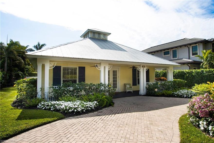 Nestled in the heart of Olde Naples, this lovely, 4 bedroom, 3.5 bath residence offers comfort, privacy, and location. As you enter the house, you are greeted with a spacious and open floor- plan, offering a cheerful interior. The living room offers a comfortable, upholstered couch, 3 side chairs, fireplace, and beautiful artwork. The dining area offers a mahogany, rectangular table, with dining for 8, buffet, and chandelier. The well- equipped kitchen offers white cabinetry, granite counters, new appliances, island, and a round kitchen table for 4. The family room offers a couch, 4 comfortable chairs, flatscreen TV, and bookshelves. The primary suite offers a king size bed, set in a wood bedframe, two side tables/lamps, dresser, comfortable chair, TV, walk-in closet, and a private bath with 2 vanities, walk-in shower and soaking tub. The 1rst guest bedroom offers a queen size bed, set in a mahogany bedframe, matching dresser, and two side tables/lamps, closet, TV, and shared bath with 1 vanity and walk-in shower. The 2nd guest suite offers 2 twin-size beds, end table, lamp, dresser, closet, and share a bath with a combination tub/shower and single vanity. The private apartment upstairs offers a king size bed, set in a white bedframe, matching end tables, dresser, comfortable couch, TV, kitchenette, and private bath with a combination tub/shower, and single vanity. Enjoy entertaining on the screened lanai and pool area ( heated). There is a dining table for 4, chaise lounges, and an outdoor gas grill. You will also enjoy a 2 car garage and 2 beach bikes. Situated on one of the most picturesque, tree lined streets in Olde Naples, and just a short walk to white, sandy beaches, 5th Avenue and Third Street shops and restaurants, this house is perfect to enjoy family, and friends.