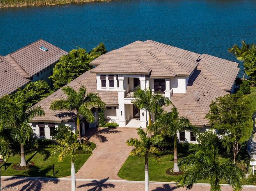 VIRTUAL SHOWINGS AVAILABLE OR CLICK ON THE VIDEO TOUR. Rarely available contemporary waterfront grand estate home in the exclusive gated enclave of Sorrento at Miromar Lakes Beach & Golf Club. The fully-furnished home completed in 2016 has 5 bedrooms, 5 bathrooms, a powder bath, pool cabana bath, family room, study, and two 2-car garages. Square footage is 9,117; 5,403 under air. Three bedrooms with en suite bathrooms and a game room with wet bar are located on the 2nd floor. Two covered balconies with numerous access points provide outdoor living for all the 2nd floor rooms. Additional features include a living room fireplace surrounded by floor-to-ceiling stone mosaic, open-concept contemporary gourmet kitchen, full-home automation, and elevator. Outdoor living encompasses several covered conversation seating areas, a summer kitchen, bar, raised sundeck, and fire pit. The half acres site looks in one direction across a nearly mile long view of Lake Como and in another to a peaceful permanent preserve. The home allows for the utmost enjoyment of Miromar Lakes 700 acres of fresh water lakes, boating, and fishing. Deeded dock rights transfer.