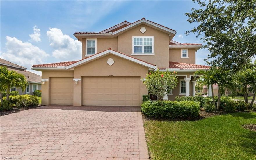 This stunning 5-bedroom, 4.5-bathroom home offers 3,581 sq. ft. of thoughtfully designed living space, perfectly situated on a serene, oversized corner lot in the desirable Moody River Estates—a gated community in North Fort Myers that's all about that relaxed Southwest Florida vibe, with easy access to the Caloosahatchee River and Gulf beyond. Views include a nature preserve and peaceful lake views from both front and back, creating a relaxing, inviting atmosphere ideal for an expanding or multi-generational family. Step inside to discover soaring ceilings, premium tile flooring throughout the main living areas, new laminate flooring in the downstairs bedroom, loft, and upstairs walkways, plus fresh carpet in the remaining bedrooms and on the stairs—along with custom finishes like plantation shutters that add elegance to every room. The main living area features a living room, formal dining room, and large family room that flows seamlessly into a beautifully appointed kitchen with granite countertops, upgraded appliances, a large pantry, expansive counter seating, casual breakfast area, and abundant cabinetry—perfect for everyday living and entertaining. Enjoy the Florida lifestyle at its best on the lanai, featuring a full outdoor kitchen ideal for hosting gatherings or simply unwinding with family and friends. The main floor also includes a versatile bedroom with ensuite full bath, walk-in shower, and walk-in closet that can easily serve as an office, guest room, or in-law suite, plus a half bath, laundry room, and attached 3-car garage. Upstairs, a large bonus room connects four additional bedrooms and three full bathrooms, including the expansive primary suite with a luxurious ensuite bath featuring dual vanities, garden soaking tub, huge shower, and two generous walk-in closets. Two brand-new Lennox air conditioning units keep everything comfortable year-round. Located in Moody River Estates, residents enjoy resort-style amenities like two pools, tennis and pickleball courts, a playground, fitness center, Gulf-access boat ramp, and so much more. With its blend of space, style, and comfort, this home truly feels like the perfect place to kick back, relax, and call your own.