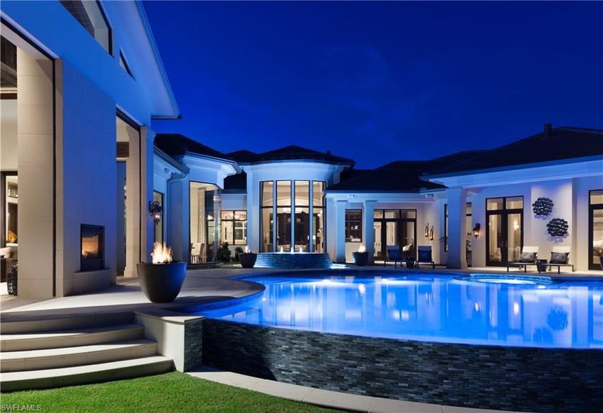 H.16212 - Winner of two 2016 Sand Dollar Awards and featured in Florida Design magazine, this Diamond Custom Home with interior designer Collins & Dupont features accessories too numerous to mention. With long, south facing views across a lake and down the 18th fairway of the Lakes course, this home has every conceivable option. The home has been wired to enable remote access to HVAC, pool and spa equipment, lights, shutters, cameras and A/V equipment and includes a generator. Two bars, each with ice makers, fridges and dishwashers with the lanai bar also featuring freezer drawers for martini and beer glasses. There is a fabulous climate controlled 900 bottle wine cellar. This is the ultimate entertaining home. Spectacular pool with LED lighting and 4 fire-bowls as well as courtyard area with bubbling pottery pots, waterfall wall and fire pit. An infarad sauna rounds out the list of luxury appointments. If you love to entertain, you must see this home.