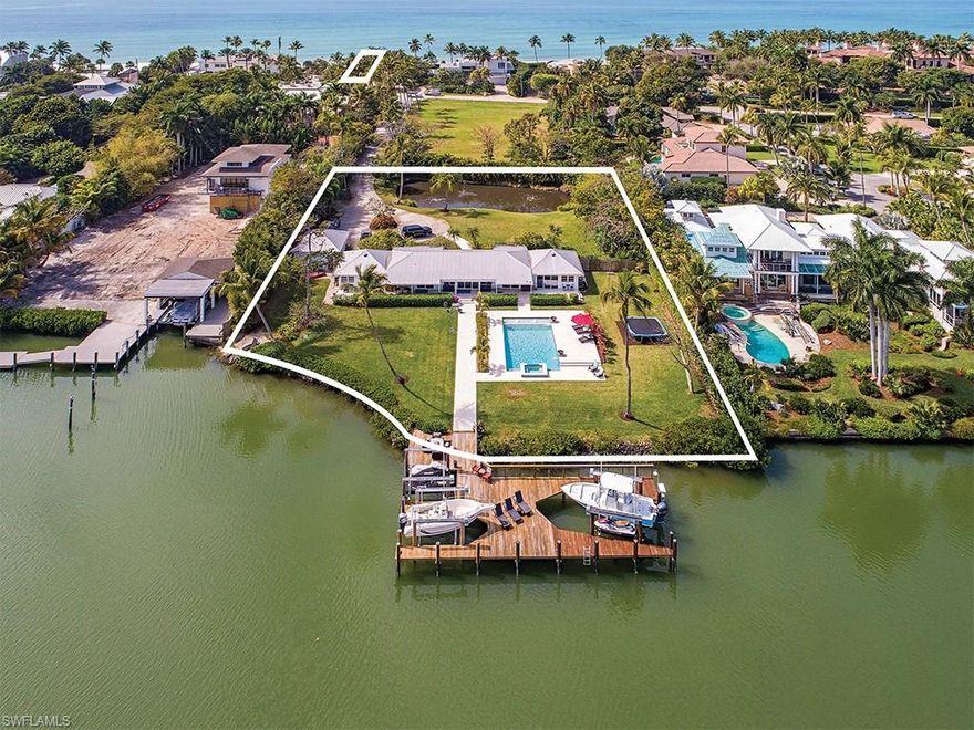 This is a once in a lifetime opportunity to buy a legacy property on Gordon Drive. The combination of a 38 x 244 private beach parcel and a 1.09 acre lot with over 210 feet of linear water frontage on Champney Bay make this a rare and unique property. A new dock built in 2015 measures 70 feet in length and has 3 lifts and underwater snook lights; 14,000 lb lift, 10,000 lb lift, and a double jet ski lift. New pool and spa built in 2017 include a large sun deck, sunshield with bubblers, deck jets, and LED lighting. The original home was built in 1953 and overlooks a natural preserve never to be built upon. Port Royal Associate membership available. This property has not changed hands since 1968.