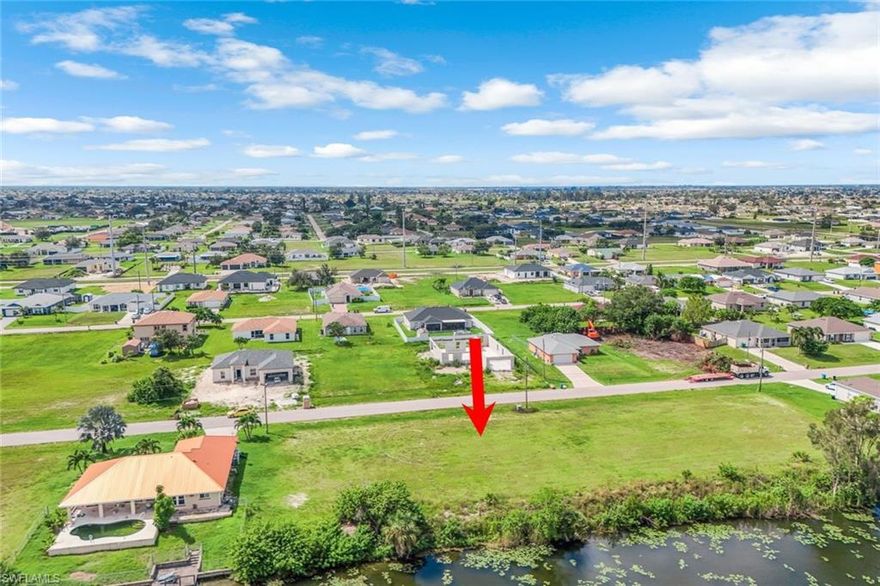 Waterfront view, located on freshwater canal. This prime lot at , is a perfect for those looking to construct a custom home in a rapidly developing area. Situated near local parks, schools, and shopping, this property provides a blend of convenience and tranquility. Located in a non-flood zone area, you’ll also enjoy easy access to main roadways. Excellent investment opportunity.
