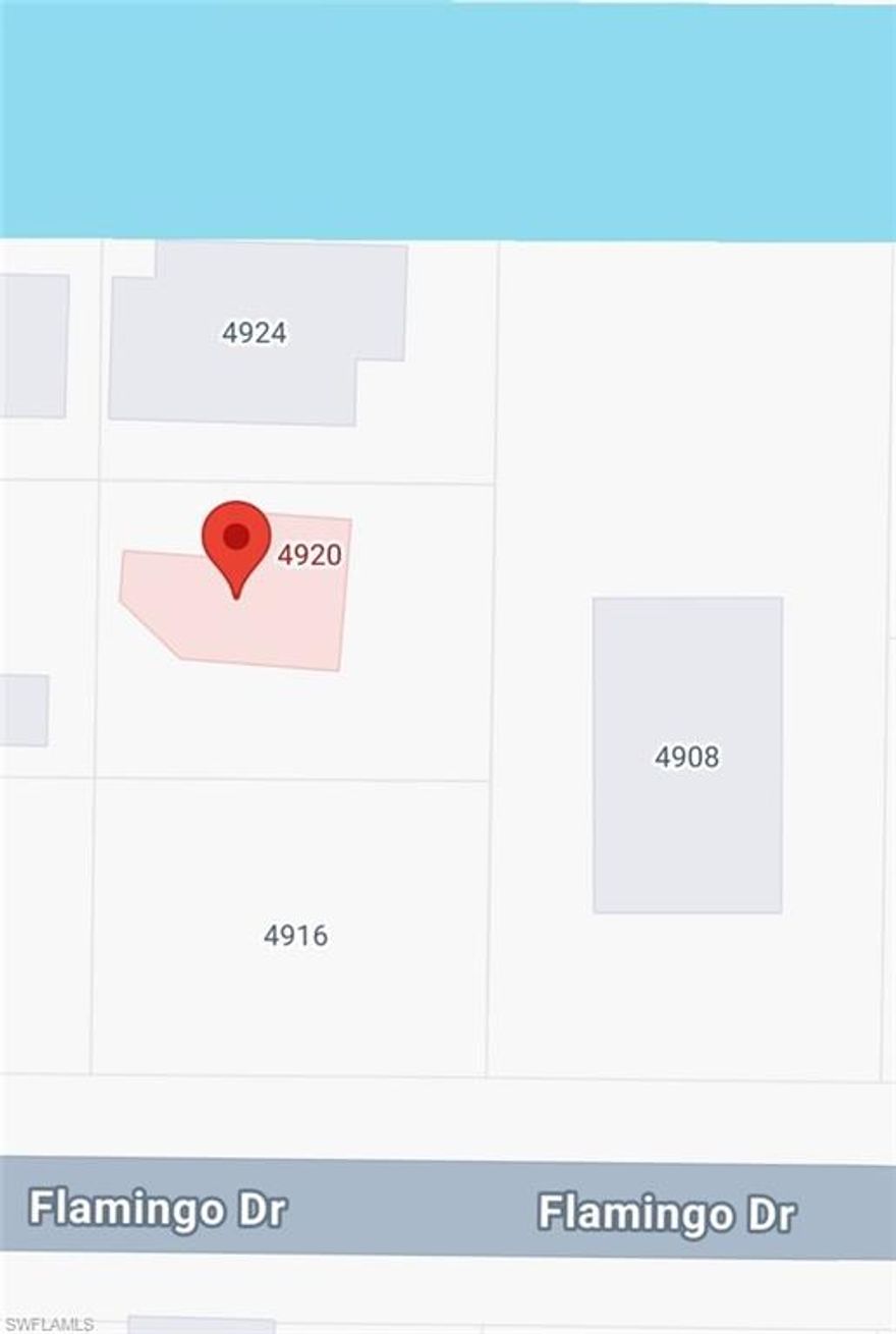 LOCATION! LOCATION! LOCATION!  Excellent lot located in the community of Flamingo Bay in St. James City.  One lot away from the canal with a partial view of the canal.  This lot offers an optional HOA that will give you access to the community club: access to pool, community boat ramp, activity building/games, and much more.  Many shopping and restaurants located within the island.  Come see this piece of paradise soon before it is gone!