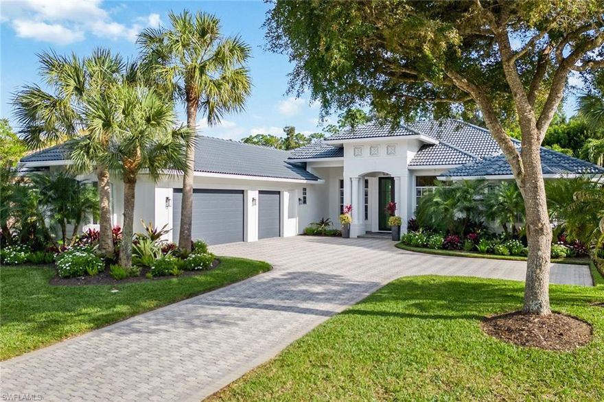 A paradigm of luxury living located on a quiet cul-de-sac in the award-winning community of Fiddler’s Creek. This exquisite property, spanning 3,136 square feet, has undergone extensive updates, including new flooring, a new kitchen with cabinets, appliances, and countertops, new guest baths including a pool bath and powder room, as well as new lighting and fans. With four bedrooms plus a den, three-and-a-half baths, and a spacious side-entry three-car garage, this home caters to a lifestyle of elegance and convenience. The exterior exudes timeless beauty with its tile roof, paver driveway, lush landscaping and expansive screened lanai. Ultimate outdoor living awaits with a heated pool and spa, pool bathroom, outdoor shower and ample covered and uncovered areas perfect for relaxation or hosting gatherings. Southern exposure and preserve views ensure a tranquil backdrop for your oasis. Stepping inside, the foyer greets you with impressive impact-glass museum-style double doors, leading into the adjacent living space boasting panoramic floor-to-ceiling windows framing the sparkling pool. The turnkey furnished interior is adorned with soaring tray ceilings, recessed lighting, contemporary fans, designer lighting, plantation shutters, a home automation system and new luxury vinyl plank flooring throughout. The heart of the home, the remodeled kitchen, is a chef’s dream featuring white shaker-style cabinets with underlighting, soft-close drawers, quartz countertops and a workstation sink. The large center island with a double waterfall edge, breakfast counter and two designer chandeliers enhance the allure, along with a dedicated coffee station, pantry cabinet and new high-end stainless steel appliances including an eight-burner gas range. The butler’s pantry mirrors the kitchen’s finishes and boasts an under-counter wine cooler and a convenient pass-through counter to the dining room. Adjacent to the kitchen, the living room presents an ideal setting for casual gatherings, highlighted by an indirect lighting tray ceiling and corner pocketing glass sliders that open to the lanai, merging indoor and outdoor spaces. The owner’s suite, a sanctuary of privacy and luxury, features a French door entry, his and hers walk-in closets with built-ins, lanai access, double tray ceiling with crown, and a spa-like ensuite bath with dual sinks, water closet, tub and shower. The laundry room includes a sink and storage. The garage is equipped with an epoxy floor, overhead storage racks, a secondary refrigerator and bay windows providing natural light. Residents have access to luxurious amenities that include a resort-style pool, spa services, casual and fine dining, a fitness center with trainers and classes, and tennis, pickleball and bocce with a full staff. Optional golf, beach and marina memberships are available. Immediate golf membership opportunities! Conveniently located between downtown Naples and the pristine beaches of Marco Island. Furnishings negotiable.