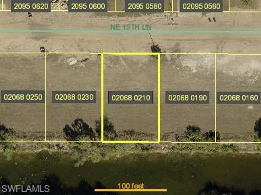 DISCOUNTED BEAUTIFUL CANAL FRONT LOT CONNECTED TO CITY UTILITIES!!!  Discover this spacious vacant lot located in the rapidly developing northeast corridor of Cape Coral. You can build a duplex or even a six plex unit on this inexpensive lot!!! 
With direct freshwater canal frontage, the property offers ample space for a single-family residence or a duplex or even a 6 plex with amazing serene water views. Just minutes from shopping, dining, schools, and parks, it’s the perfect canvas for your Florida dream home. Whether you're a builder, investor, or future homeowner, this parcel is a smart buy in an up-and-coming area.