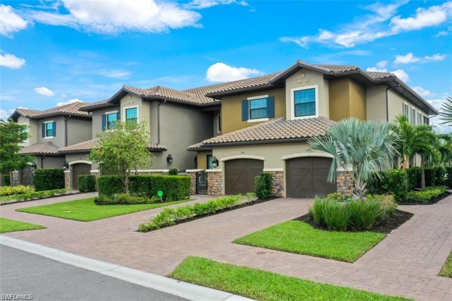 LIVE A VACATION LIFESTYLE IN ESPLANADE! Built in 2020, this second floor, end unit coach home/condo offers an open and airy floorplan including a generous kitchen with 9'x6' center island and zero corner sliding glass doors to the lanai overlooking the lake & preserve. A long list of special features include: HURRICANE IMPACT WINDOWS/DOORS; plantation shutters; Cambria quartz countertops; white shaker style cabinets with pull outs; 10' ceilings/8' doors; wood flooring; electric fireplace; closet cabinets; attached garage; and more! This home comes with a CLUB/SPORTS MEMBERSHIP which gives you access to all amenities with the exception of in-season golf! Esplanade is a true "Lifestyle Community" with something for everyone: Resort Pool complete with cabanas; 6 tennis courts; 4 bocce balls courts; 4 pickleball courts; Koquina Day Spa offering hair, nail, facial, and spa treatments; Techno Gym with Aerobics Room; Gated Dog Park; Poolside Bahama Bar; 14 miles of bike/walking trails; 18 hole private golf course; 15,000 Sq Ft Culinary Center featuring restaurant, bars, wine tasting room, wine lockers, & Starbucks style cafe!