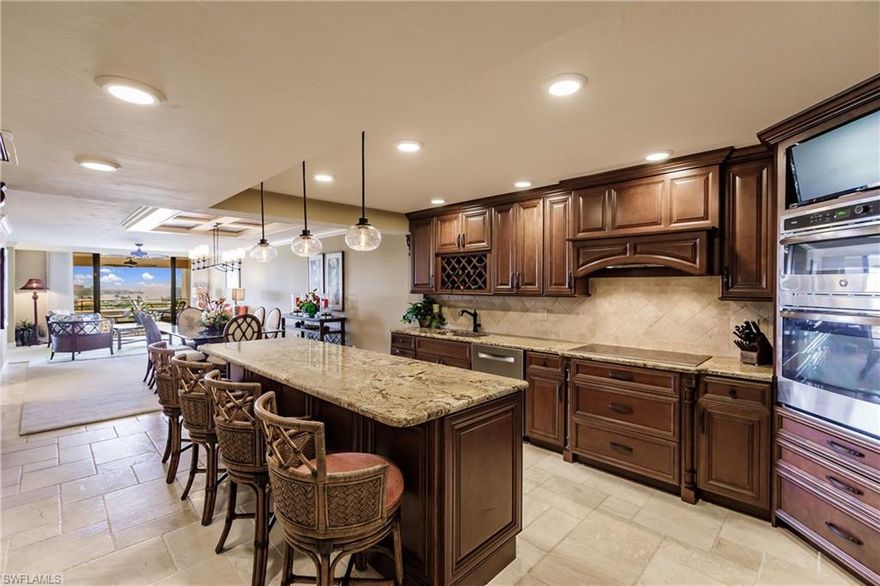 From BREATHTAKING VIEWS to over $250,000.00 in CUSTOM UPDATES, this condo has it ALL!  Enjoy Fabulous River and Sunset views from your Expansive TRAVERTINE Lanai.  Turn-Key, High-end, Tommy Bahama furnishings and accessories, (even down to matching dishes) $75,000.00 value.  Open and Spacious lay-out, including Den. Move in and enjoy an UPSCALE New kitchen with Granite Island, Stainless Steel Appliances. Travertine and custom carpet throughout, solid wood doors, crown molding, light fixtures, Bar with wine fridge, hurricane shutters, newer air, electrical, plumbing, all NEW redesigned baths, window treatments w/ remote, Plenty of added storage. The LUXURY Master Bedroom features OFFICE, TWO walk-in closets, and private lanai... Incredible Master bath w/ HUGE walk-in Shower. Even the laundry room is stunning!  METICULOUS! The Landings Yacht Golf and Tennis Club is one of the most prestigious River-Front communities off McGregor.  Enter through the guarded gates into Lush park-like grounds. AMENITIES INCLUDED: BOAT-SLIP, FULL-SERVICE MARINA, UNLIMITED GOLF, TENNIS, PICKLE-BALL, BOCCE-BALL, FITNESS-CENTER, RESTAURANTS, POOLS, CLUBS, ACTIVITIES and so much more!