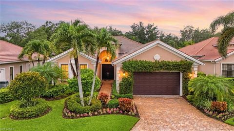 Photo of 5717 Hammock Isles DR, NAPLES, FL 34119 (MLS # 226021563)