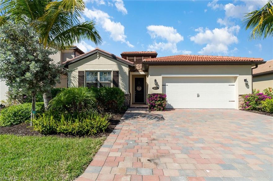 You’ll love this stunning 3 bed, 2 bath turnkey home in the highly desired, gated community of Barrington Woods in North Naples which was built around several lakes, preserves, and cypress woods, creating a natural, serene setting.  The star of this home, and where you will spend much of your time,  is the recently added pool and spa area with a gorgeous pavered deck and plenty of room for entertaining or just relaxing.  The center of the home is the bright and light kitchen with white shaker cabinets, granite countertops, stainless steel appliances, and a large island with breakfast bar, perfect for prepping or partying, which is open to the great room with ample space for living and dining on beautifully tiled flooring.  The den is a perfect office or homework area with a built-in desk that runs the length of the room and cabinets and shelving to keep you fully organized. The generous main bedroom features a large walk-in closet and roomy ensuite with dual sinks, a vanity area, and a large glass-enclosed shower. Two more tastefully furnished bedrooms and another well-equipped bathroom leave plenty of room for guests.