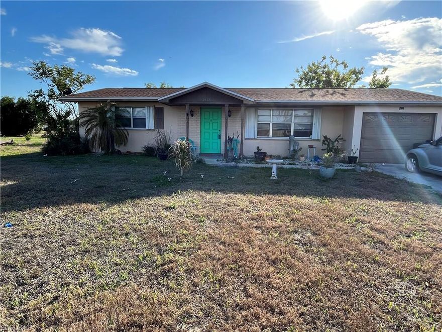 Charming and affordable single-family home located at the end of a quiet street in Lehigh Acres. This 2-bedroom, 1.5-bath home sits on an oversized lot of approximately 0.35 acres and faces a peaceful canal, offering added privacy and a relaxing natural backdrop. The home features a functional layout with a comfortable living area, a Florida room, spacious bedrooms, and a convenient half bath located off the utility area. The roof was replaced in 2022, Water Heater replaced in 2023, and the electrical panel was replaced in 2023. The property has a large yard with plenty of room for outdoor living, gardening, or future improvements. The property also includes a one-car garage and paved driveway for additional parking. Conveniently located near schools, shopping, dining, and major roadways, making it easy to access everything Southwest Florida has to offer. This property is ideal for first-time homebuyers, investors, or anyone looking for an affordable home on a large lot with a canal view in a quiet neighborhood.