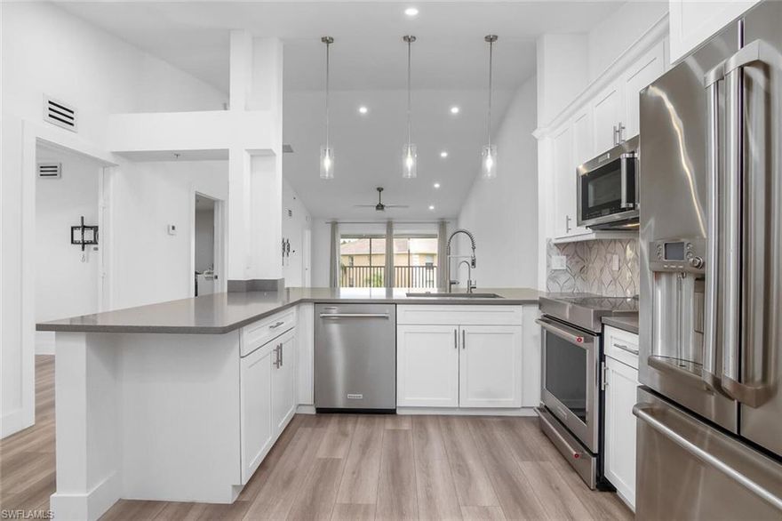 RARE OPPORTUNITY to own a NEWLY FULLY RENOVATED 3rd floor end unit with 3 Bedroom & 2 Baths in Victoria Shores. Centrally located in North Naples, only minutes from Vanderbilt Beach, Shopping & restaurants. 
This condo has been updated with an open kitchen that includes a bar, new cabinets, Quartz countertops, sink/faucets, recessed lighting, track lighting, fixtures, fans, stainless steel KitchenAid & Ge appliances, etc. Bathrooms have been redesigned with new vanities, tiled showers, new sinks/faucets, lighting, mirrors & Quartz countertops.  Laminate flooring has been installed throughout the condo with tile on the lanai.
Amenities include a Community pool/Sun deck & Tennis Courts. **Low HOA Fees **Pets welcome