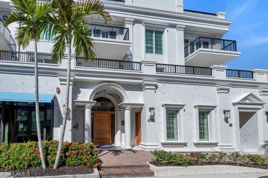 A truly one-of-a-kind Villa at the prestigious Residences at 5th on 5th, this exceptional villa offers approximately 5,000 square feet under air and 7,400 square feet total, perfectly positioned on iconic 5th Avenue South. Rare 5 car parking and private rooftop deck! The residence features three bedrooms plus a den, easily convertible to a fourth bedroom, and four and a half baths, delivering the scale and privacy of a single-family home with the ease of condominium living. Rich wood flooring, French doors, and private balconies create an elegant and inviting atmosphere. The chef’s kitchen is outfitted with premium appliances, a gas range, custom cabinetry, and an expansive island ideal for entertaining. A private elevator leads to the primary suite, a serene retreat with its own balcony and spa-inspired bath. Designed for extraordinary living, the home includes a rare underground entertaining room with a bar and a theater, as well as a private rooftop oasis with outdoor kitchen, jacuzzi, and sweeping sunset views. Five private parking spaces, including an attached two-car garage, add exceptional convenience. Just moments from world-class dining, nightlife, and only five blocks from the beach, this residence represents luxury living at its finest.