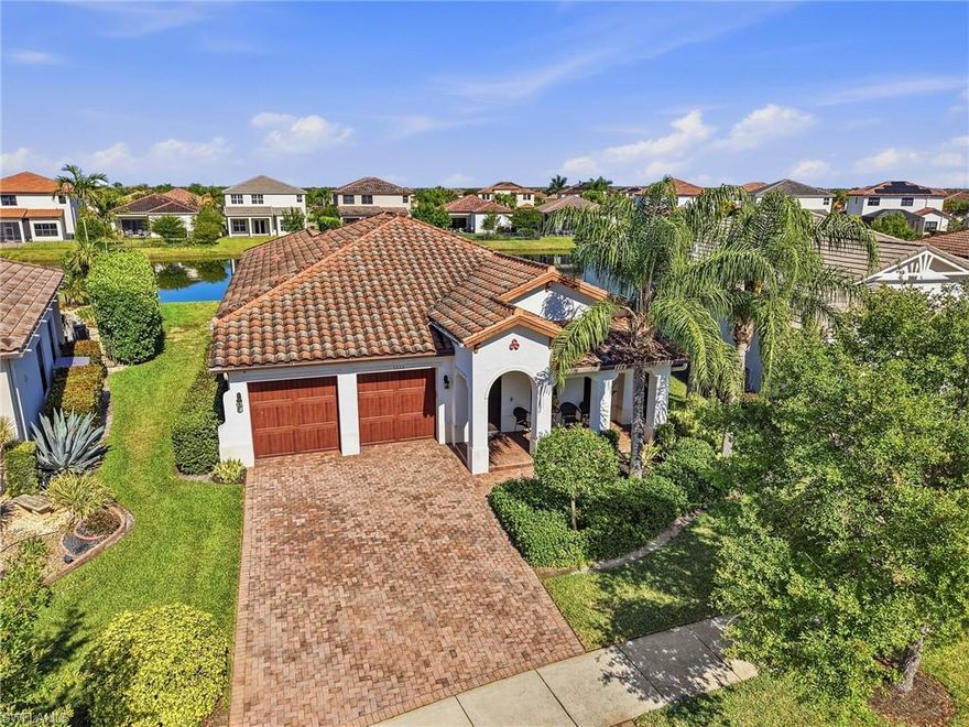 Welcome to 5050 Trevi Avenue, a beautifully maintained 3 bedroom, 2 bathroom lakefront home in the highly desirable Maple Ridge community of Ave Maria, Florida. This move in ready residence offers the perfect blend of luxury, comfort, and location in one of Southwest Florida’s fastest growing real estate markets.

Built in 2014 and meticulously cared for, this home showcases exceptional pride of ownership with modern upgrades and timeless design. Featuring rare double lake views, enjoy peaceful waterfront scenery from both the front and back of the property, creating a serene and highly sought after Florida lifestyle.

The interior offers a spacious open concept floor plan filled with natural light, designed for both everyday living and entertaining. The primary suite is generously sized and serves as a private retreat, featuring a luxurious en suite bathroom with dual sinks, a soaking tub, a separate shower, and a large walk in closet.

Upgrades throughout the home include elegant wood flooring, a newer air conditioning system, a new water heater, and hurricane impact windows and doors for added protection and energy efficiency. Additional features include custom window treatments with blackout options, a modern glass shower enclosure in the guest bathroom, and a well equipped laundry room with a utility sink. An insulated garage door and enhanced attic insulation further contribute to comfort and efficiency.

Located just minutes from the vibrant Ave Maria Town Center and Publix, this home provides convenient access to shopping, dining, and daily essentials while maintaining a peaceful residential setting.

Residents of Maple Ridge enjoy access to resort style amenities including a clubhouse, swimming pool, fitness center, aerobics studio, pickleball courts, basketball courts, playground, and community gathering spaces. This amenity rich community is known for its active lifestyle and strong neighborhood appeal.

Perfect for buyers searching for homes for sale in Ave Maria, lakefront homes in Southwest Florida, or a primary residence, seasonal home, or investment property, this is a rare opportunity to own in a high demand area.
Experience elevated living in Ave Maria real estate with this meticulously maintained waterfront home that truly stands out.